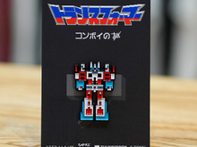 伝説のファミコン用ソフト『コンボイの謎』まさかのグッズ化―「背景に溶け込んで見にくい敵の弾」のTシャツなどセンスが光る 画像