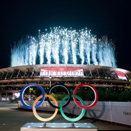 TOKYO, JAPAN - JULY 23: A general view outside the stadium as fireworks are let off during the Opening Ceremony of the Tokyo 2020 Olympic Games at Olympic Stadium on July 23, 2021 in Tokyo, Japan. (Photo by Lintao Zhang/Getty Images)