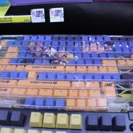 『スト6』モニターマスコットが可愛すぎる…！コラボグッズやアパレルなどがクールなGRAPHT物販ブースレポ【TGS2025】