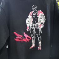 『スト6』モニターマスコットが可愛すぎる…！コラボグッズやアパレルなどがクールなGRAPHT物販ブースレポ【TGS2025】