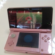 なつお。画面に映り込んでいるのは、ゲームショウ会場