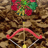 戦闘画面。回転するピザのような的に矢を放ちましょう。