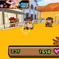 右側には、思わず撃ちたくなるギターを持ったおじさんが