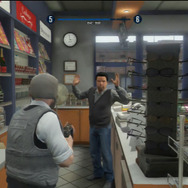 オープンワールドで可能な略奪。店員に銃を突きつけて金を奪おう