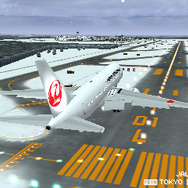 雪の新千歳に到着するJALの機体