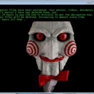 腹話術人形ビリーの画像を表示する「JIGSAW」